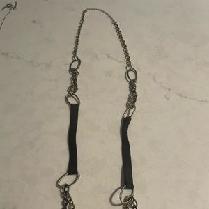 Necklace with black faux leather accent